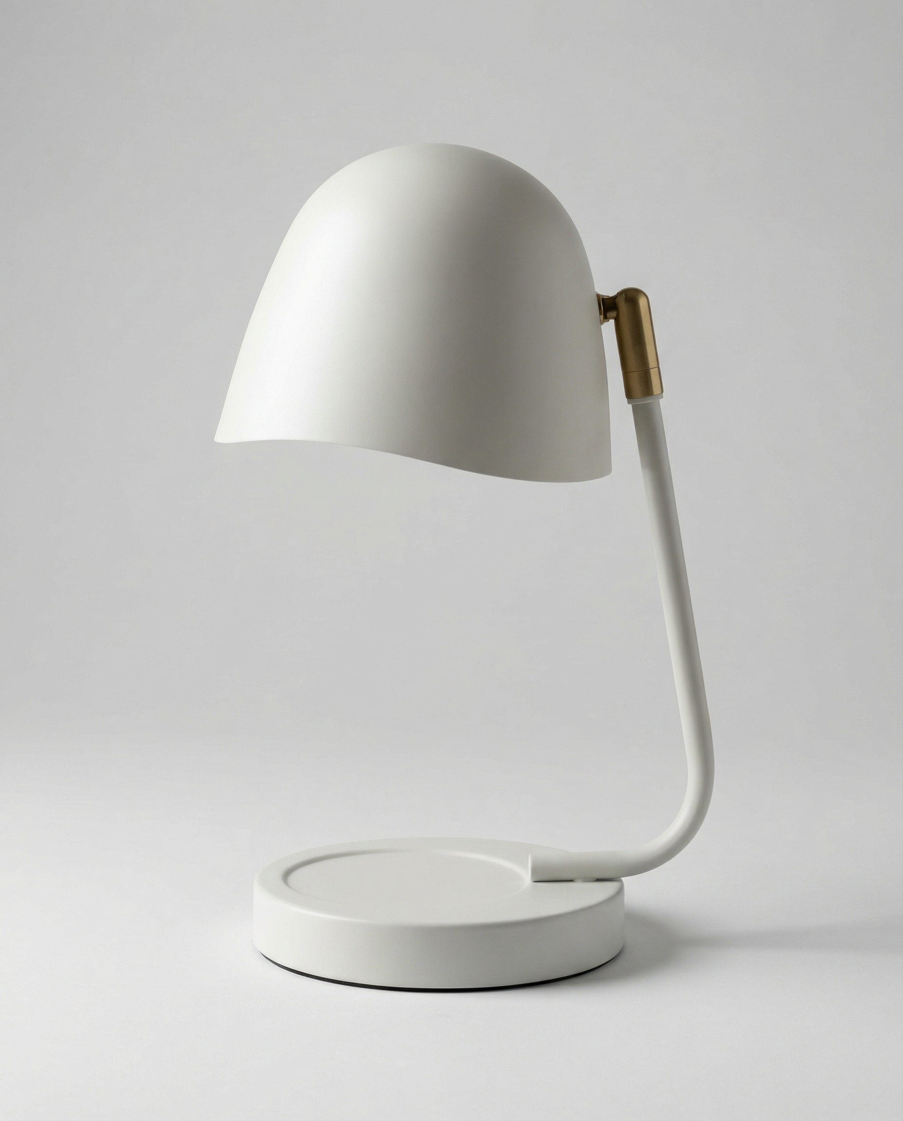 Cream candle warmer lamp with a gold handle on a white background
