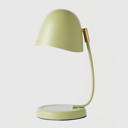 Green candle warmer lamp on a white background